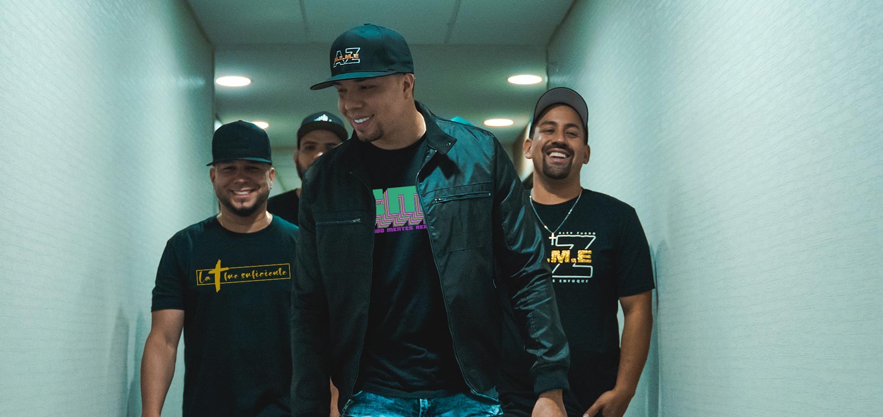 Black and white portrait of a dance instructor against a light background.