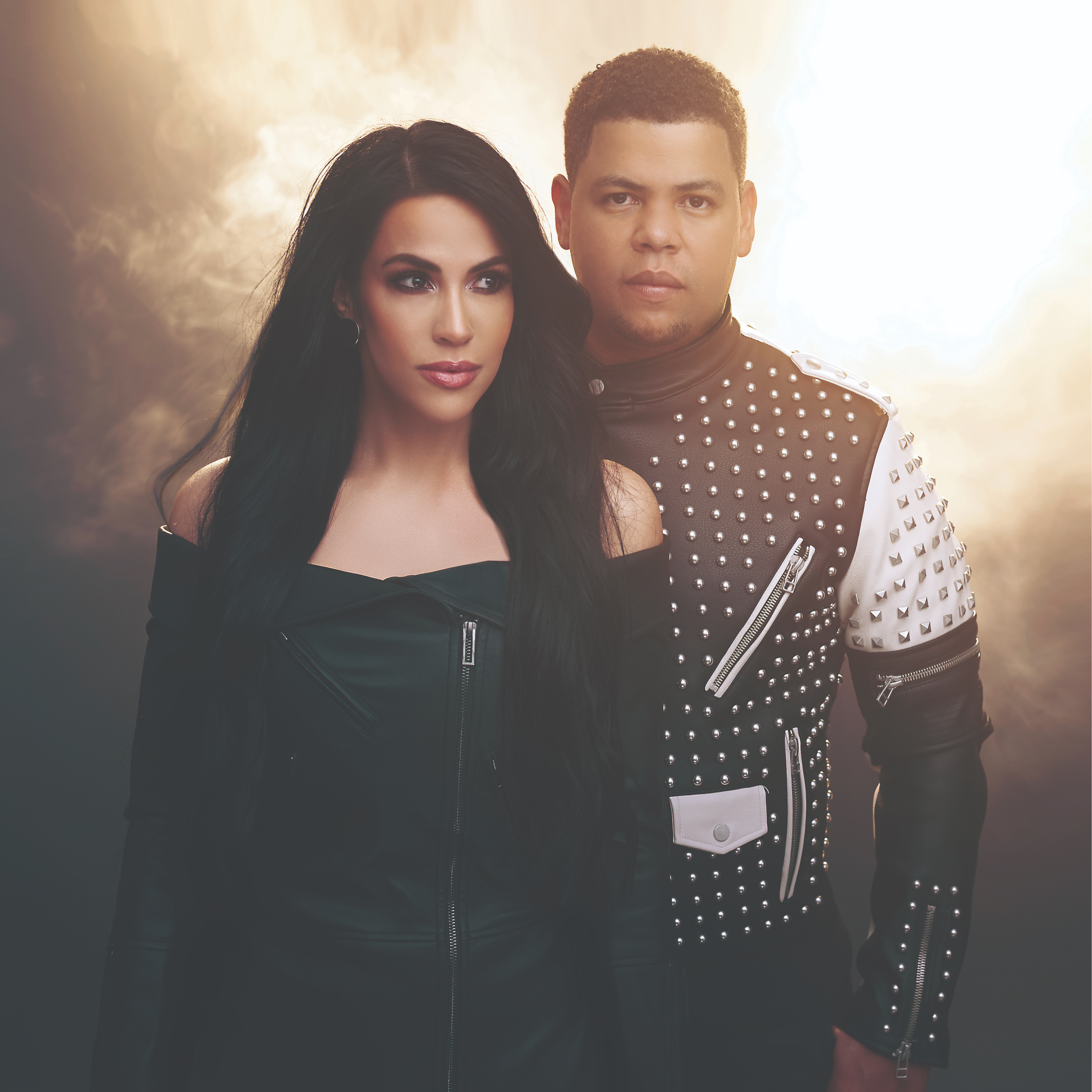 Black and white portrait of a dance instructor against a light background.